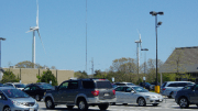 Fairhaven's turbines loom behind the Stop & Shop (right side) parking lot